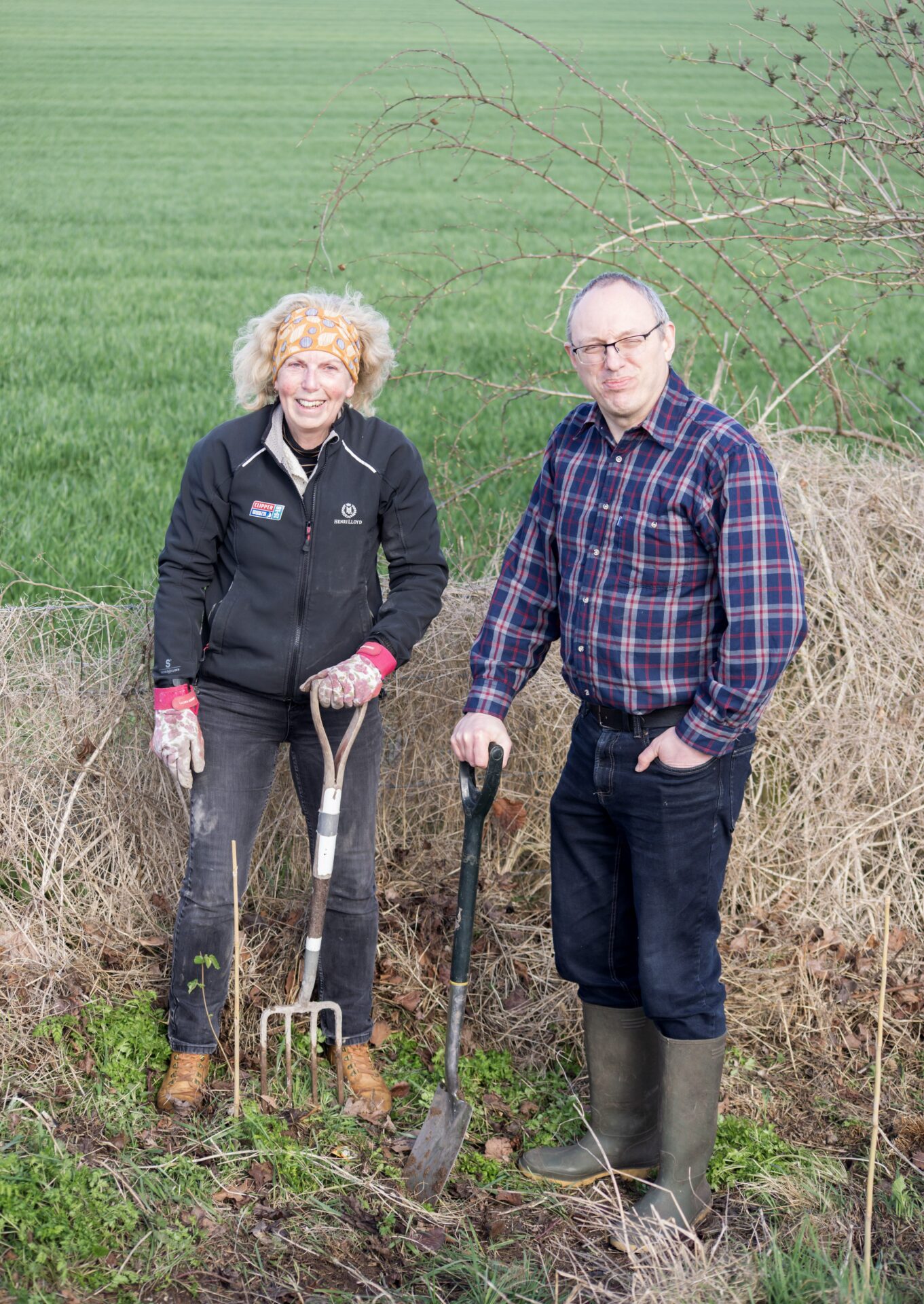 Sue Luther from New Sarum WI joins Nick Baker to plant trees at Norman Drive Open Space