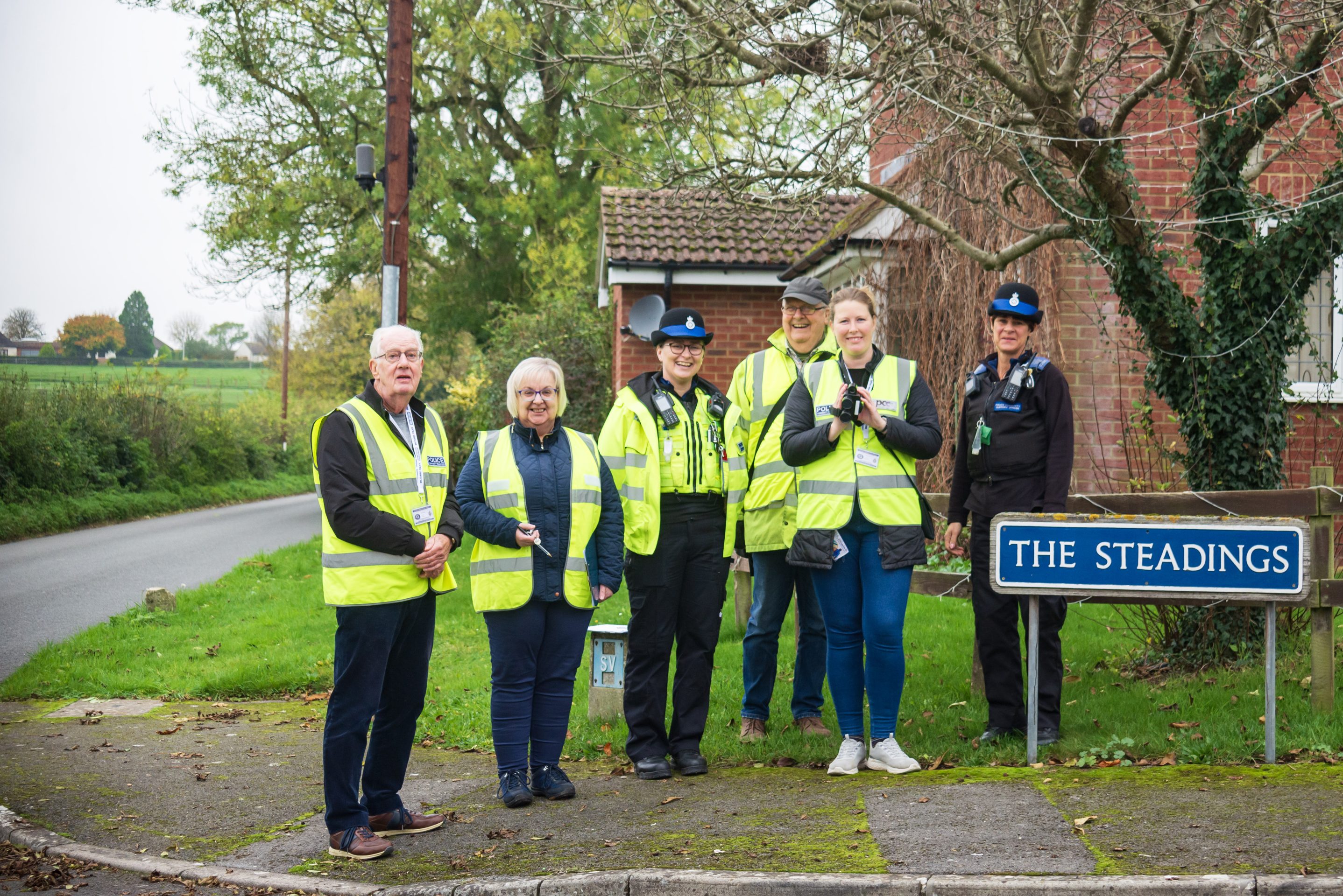 PSCO Moss from the Neighbourhood Police Team joins the volunteers