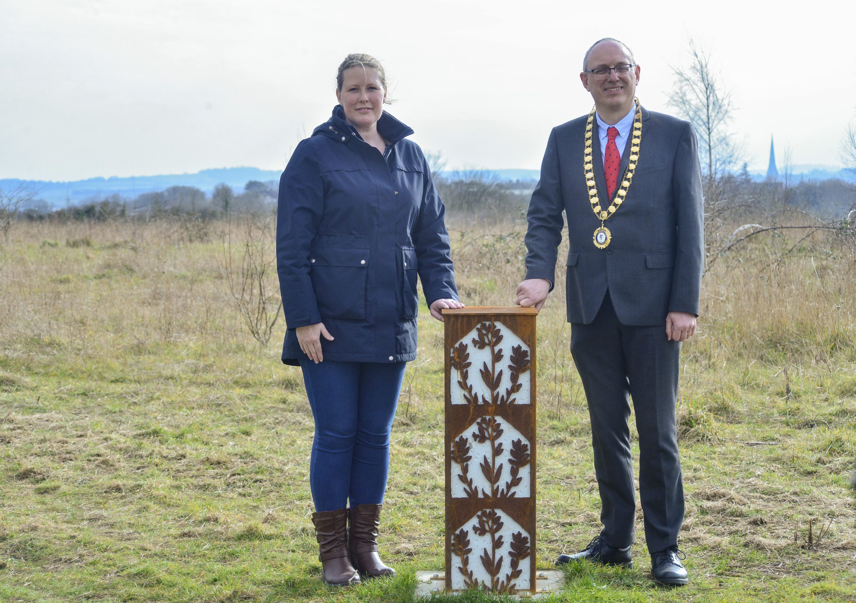 Vice Chair, Laura Jones with Chair, Nick Baker by the Horseshoe Vetch Pillar