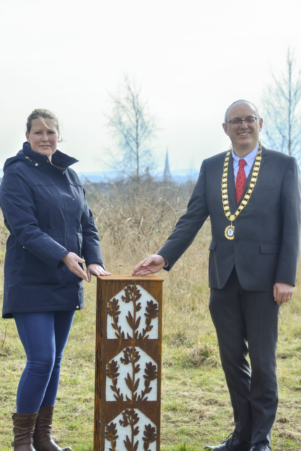 Vice Chair, Laura Jones with Chair, Nick Baker by the Horseshoe Vetch Pillar