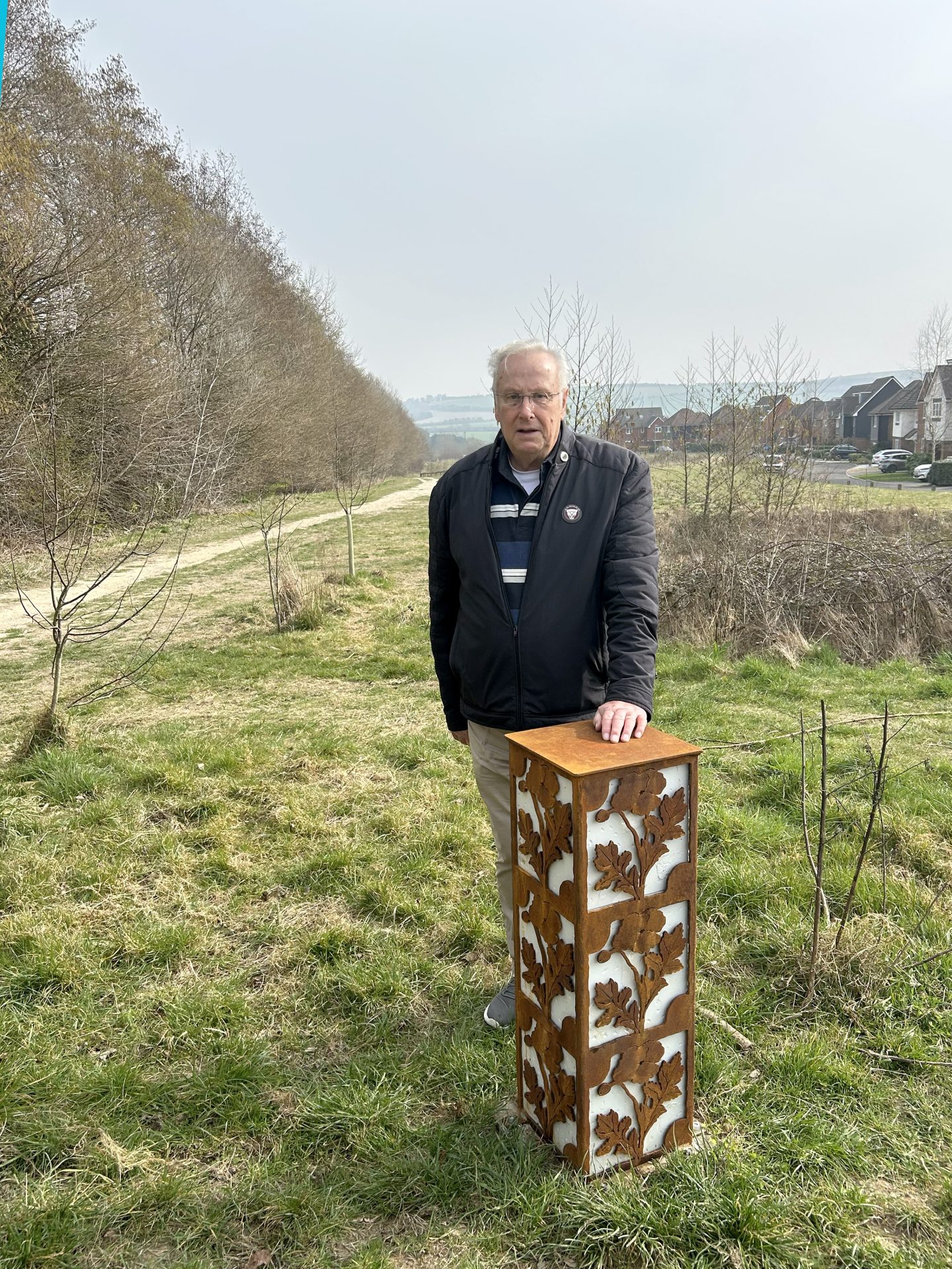 Former Councillor and Chair, Ron Champion by the Poppy Pillar